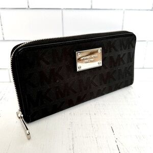 Michael Kors Signature Coated Canvas Zip Around Wallet Black MK logo pattern